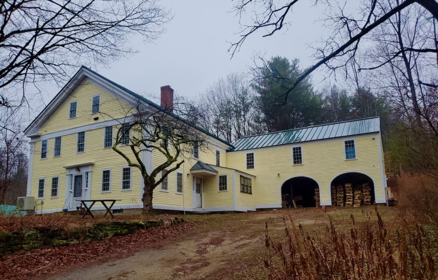 After sitting vacant for decades. the 250-year-old New Hampshire farmhouse has a fresh coat of paint, running water and heat. (Patrick McNameeKing)