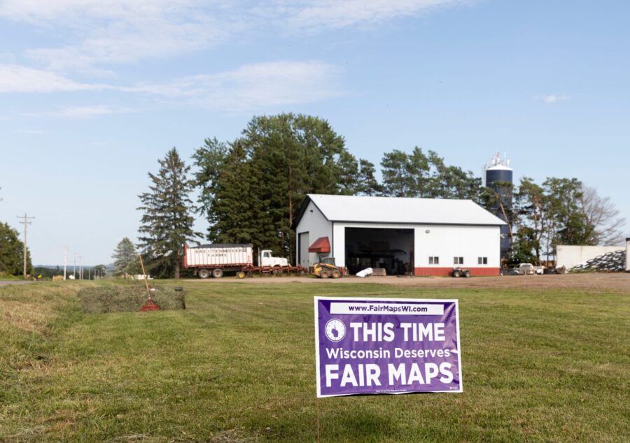 A sign for Fair Maps Wisconsin on Hans Breitenmoser’s farm in Merrill, Wisconsin.