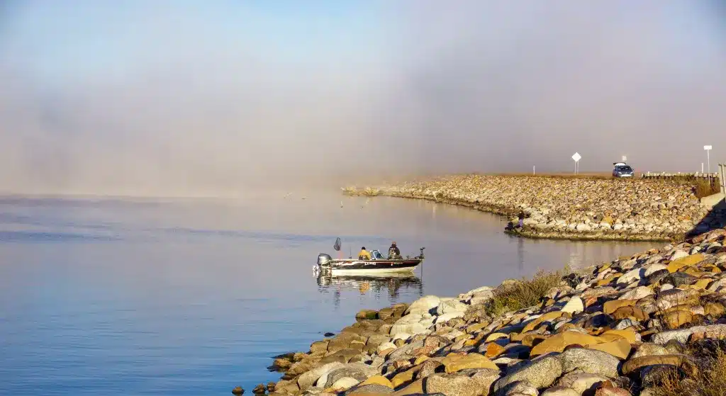 A small fishing boat on a lake